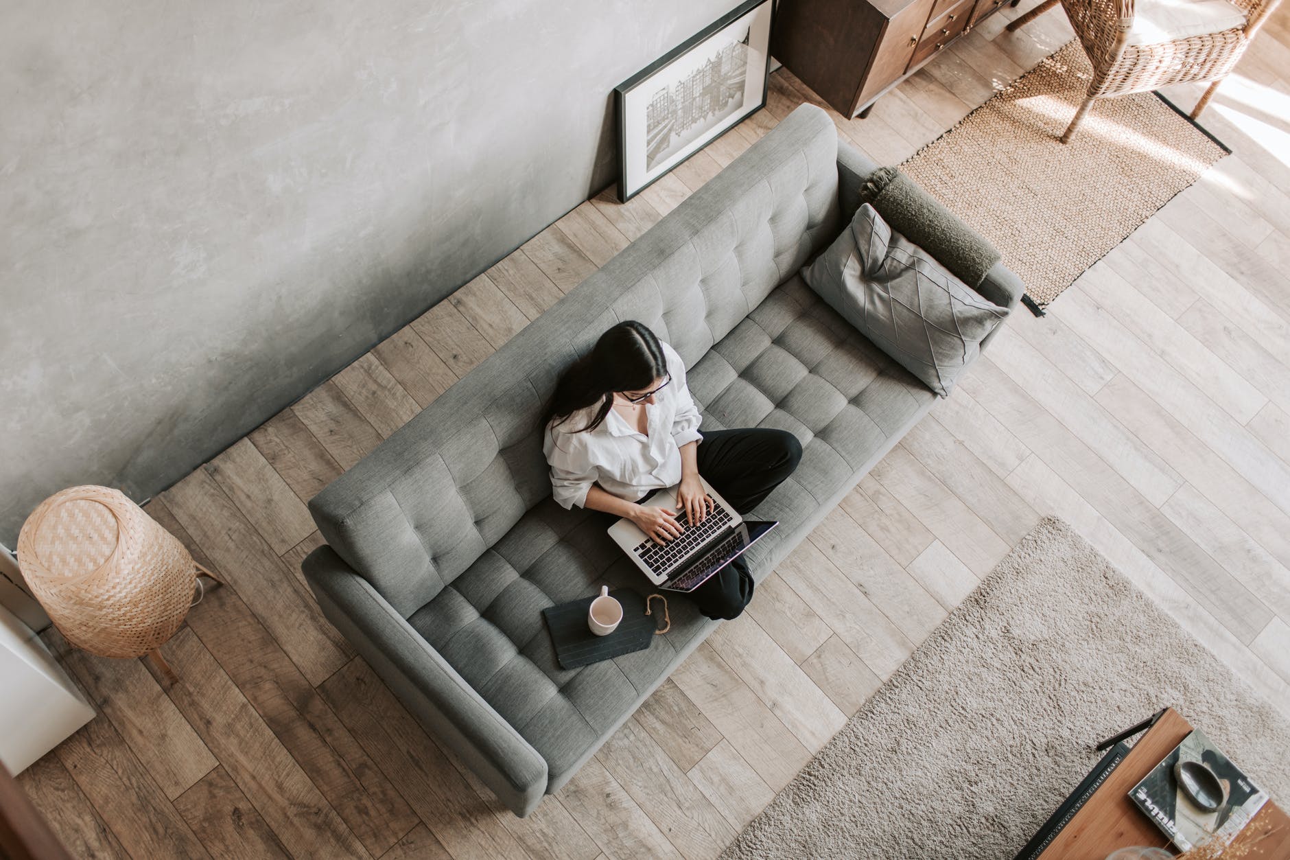 woman using laptop at home, smart money bro