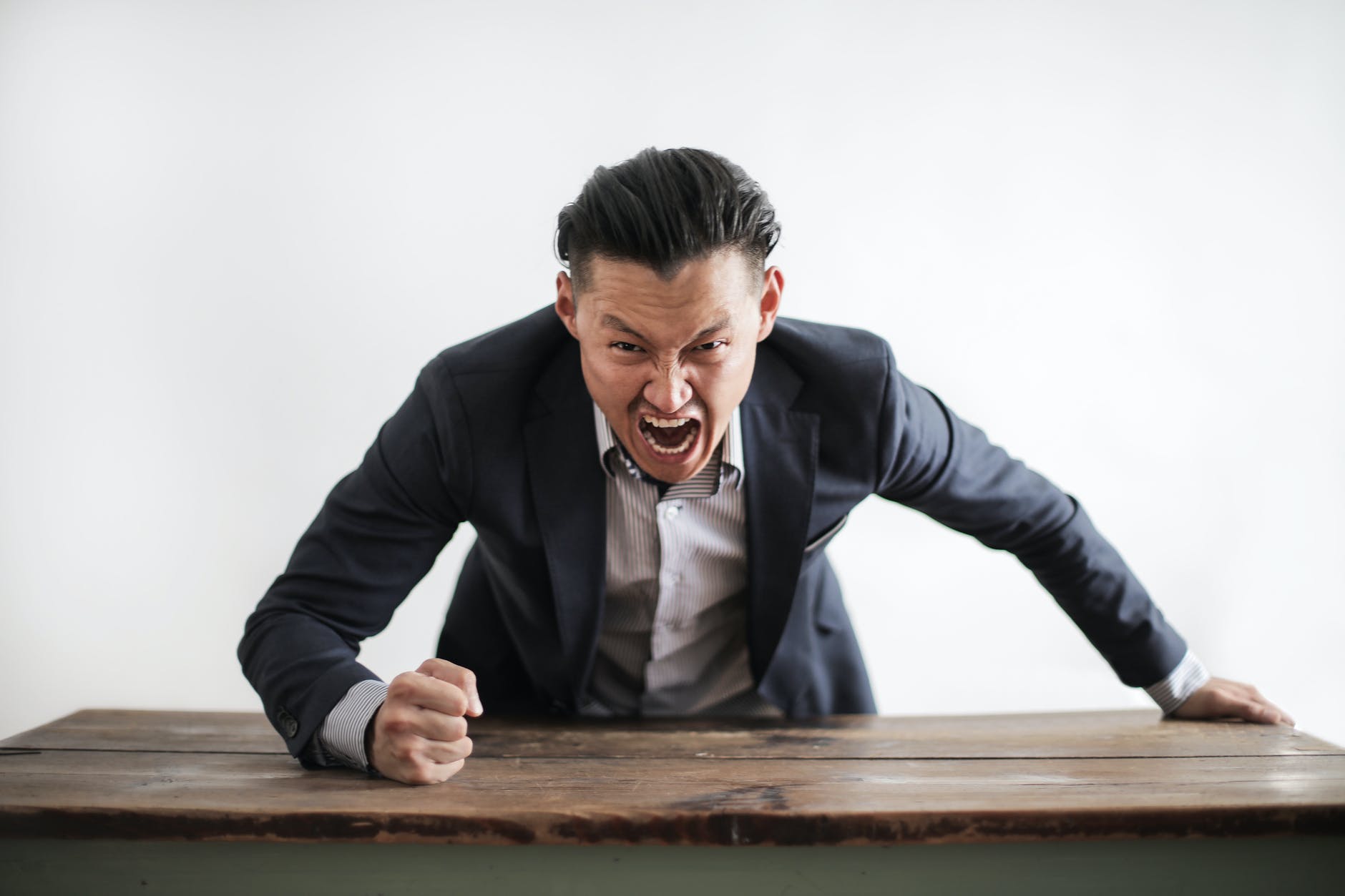 mad formal executive man yelling at camera, smart money bro